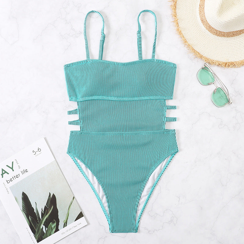 green one-piece swimsuit