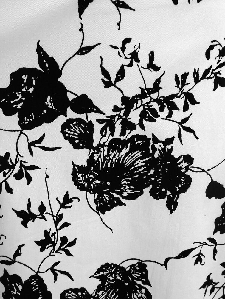 Schwarzes 50er Jahre Swingkleid mit Blumenmuster